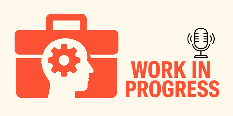 A cog inside a head icon, in front of an icon of a briefcase. Next to it are the words "work in progress" with a microphone icon on top of the words.