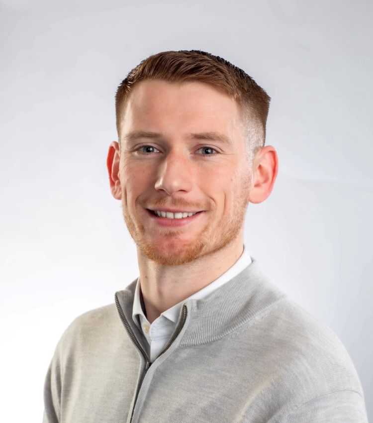 Lewis Hodges looks into the camera
