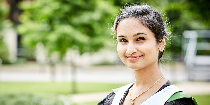A portrait of Siddha Maloo on campus on graduation day
