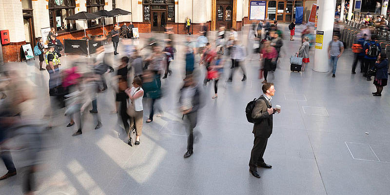 Commuters in a busy train station