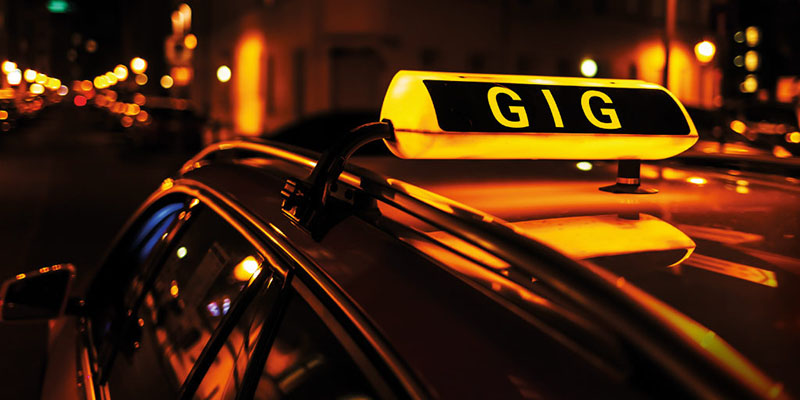 Photograph of a taxi sign atop a car, with the word &#039;Gig&#039; instead of &#039;Taxi&#039; being displayed