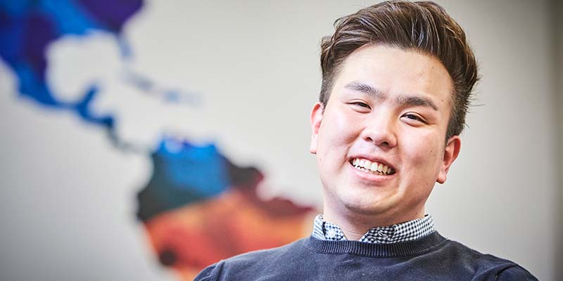 Student Peter Kang smiling
