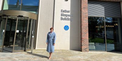 Kathryn Watson outside the Esther Simpson building