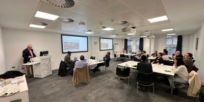 Colleagues watching a presentation.