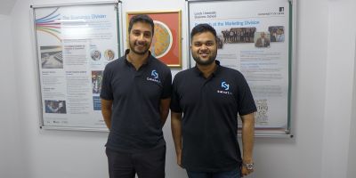 Standing on the left is Smartia employee Asim Majid and on the right is Parvez Alam Kazi