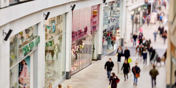 Shoppers and shops in a shopping centre