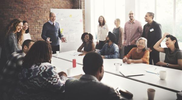 Business leaders around a boardroom table