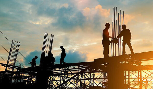 Image of construction workers on a scaffold