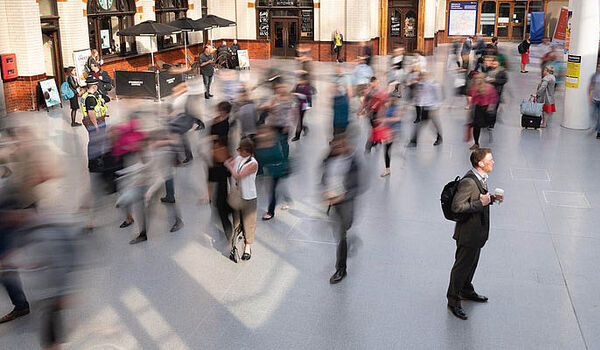 Commuters in a busy train station