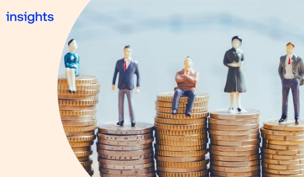 Small figurines of people standing or sitting on stacks of voins of varying heights. There is a cream curve overlay to the left of the image with the wordmark 