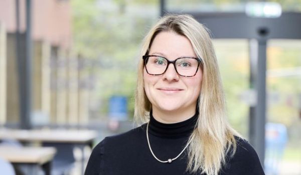 Headshot of Dr Nathalie Benesova, smiling at the cameria