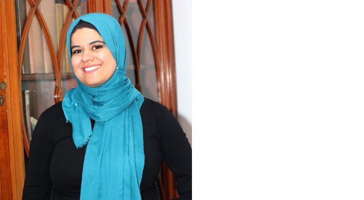 Portrait of Dr Maria Hussain smiling into camera