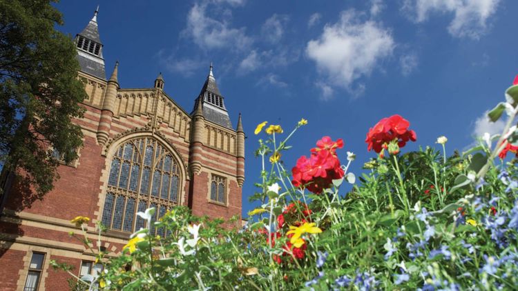 Great Hall with blue skies and flowers