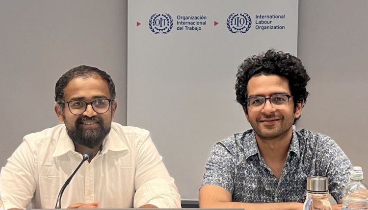 Aju John and Aditya Ray sat next to each other
