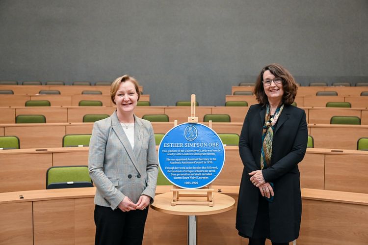 Julia Bennell and Simone Buitendijk with the blue plaque honouring Esther Simpson