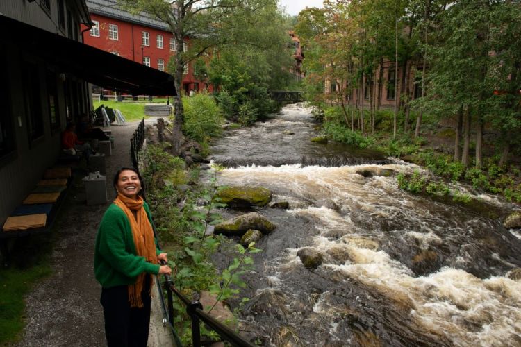 Dr Paloma Guzman stood smiling by the Mesna river