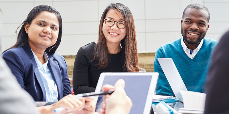 Group of students working outside