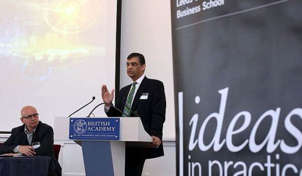 Photograph of Rashik Parmar presenting at the Big Data Symposium.