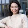 Christine Ma outside the entrance to the Maurice Keyworth building