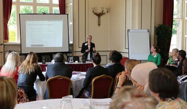 Photograph of Professor Caroline Gatrell presenting at a NARTI conference